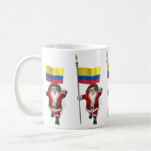 サンタクロースとコロンビアの看板 コーヒーマグカップ (左)