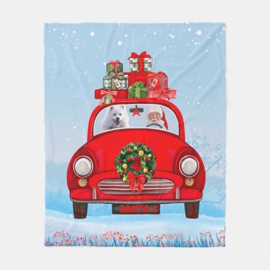 サンタクロースと一緒に車に乗ったアメリカ人のエスキモー犬 フリースブランケット (正面)