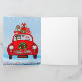 サンタクロースと一緒に車に乗るオーストラリアン・シェパード犬 カード (内部)