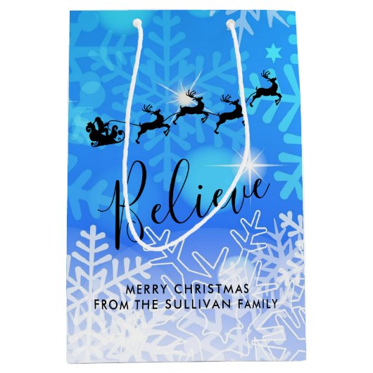 サンタクロースと彼飛んでいるのトナカイ信じ- ミディアムペーパーバッグ (正面)