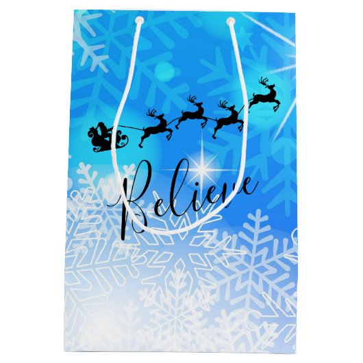 サンタクロースと彼飛んでいるのトナカイ信じ- ミディアムペーパーバッグ (裏面)