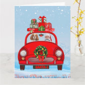 サンタクロースと愛犬が乗った車 カード (黄色い花)