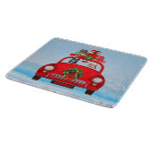 サンタクロースと車で黒いドイツの羊飼い犬 カッティングボード (角)