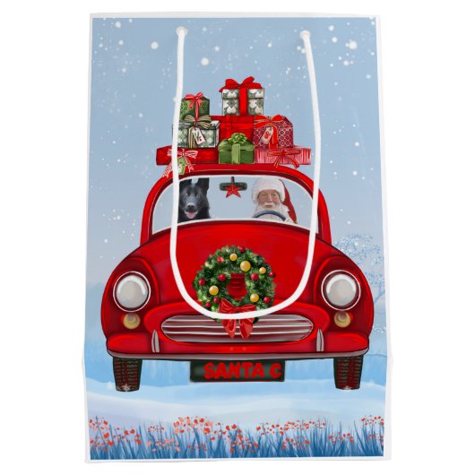 サンタクロースと車で黒いドイツの羊飼い犬 ミディアムペーパーバッグ (裏面)