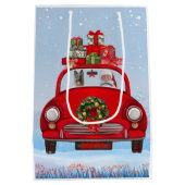 サンタクロースと車に乗ったドイツの羊飼い犬 ミディアムペーパーバッグ (裏面)