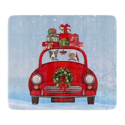 サンタクロースと車に乗ったブルテリア犬 カッティングボード (正面)