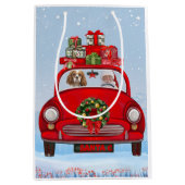 サンタクロースと車に乗った騎馬王の犬 ミディアムペーパーバッグ (正面)