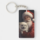 サンタクロースと過ごすクリスマスのアメリカン・エスキモー犬 キーホルダー (正面)