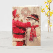 サンタクロースと雪だるまが雪の中で カード (黄色い花)