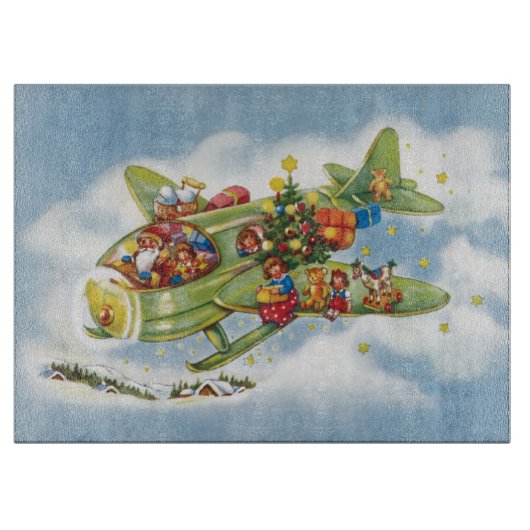 サンタクロースと飛行機のヴィンテージ飛んでいるクリスマス カッティングボード (正面)