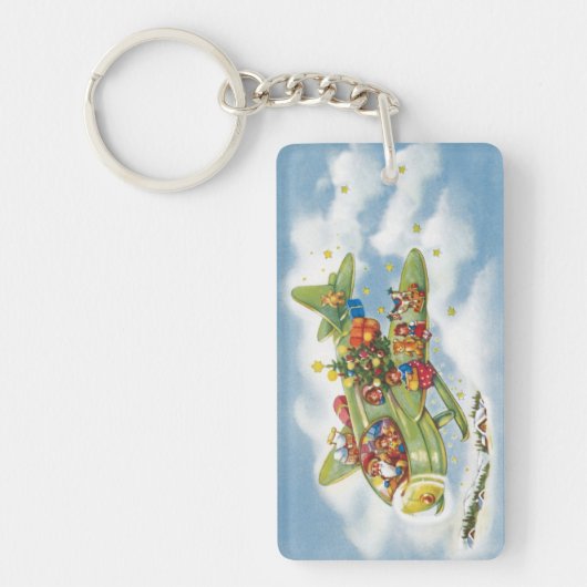サンタクロースと飛行機のヴィンテージ飛んでいるクリスマス キーホルダー (正面)