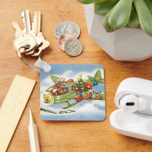 サンタクロースと飛行機のヴィンテージ飛んでいるクリスマス キーホルダー (デスク)