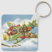 サンタクロースと飛行機のヴィンテージ飛んでいるクリスマス キーホルダー (裏面)