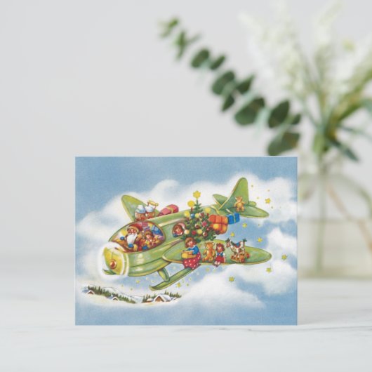 サンタクロースと飛行機のヴィンテージ飛んでいるクリスマス シーズンポストカード (スタンド正面)