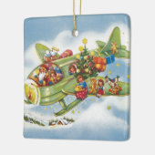 サンタクロースと飛行機のヴィンテージ飛んでいるクリスマス セラミックオーナメント (左)