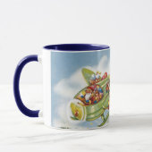 サンタクロースと飛行機のヴィンテージ飛んでいるクリスマス マグカップ (左)