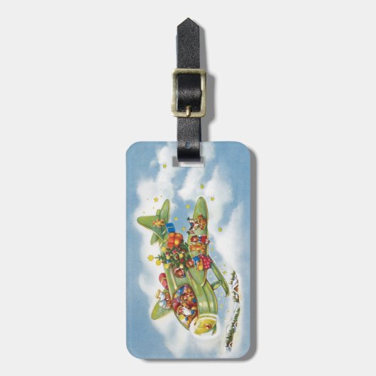 サンタクロースと飛行機のヴィンテージ飛んでいるクリスマス ラゲッジタグ (正面縦)