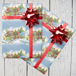 サンタクロースと飛行機のヴィンテージ飛んでいるクリスマス ラッピングペーパー