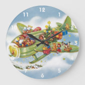 サンタクロースと飛行機のヴィンテージ飛んでいるクリスマス ラージ壁時計 (正面)