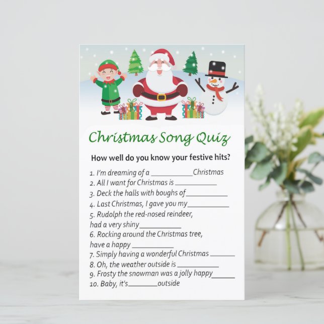 サンタクロースのクリスマスソングのクイズゲームを楽しむ (スタンド正面)
