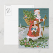 サンタクロースのクリスマスツリーのバスケットのおもちゃホリー シーズンポストカード (正面/裏面)