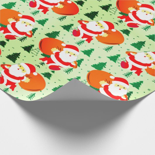サンタクロースのクリスマスツリークリスマスホリデーカワイイ ラッピングペーパー (角)