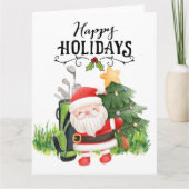 サンタクロースのゴルファーとゴルフクリスマス カード (正面)