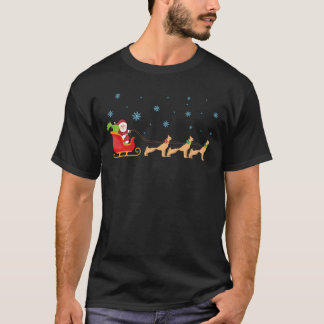 サンタクロースのジャーマン・シェパード犬のトナカイのクリスマス Tシャツ