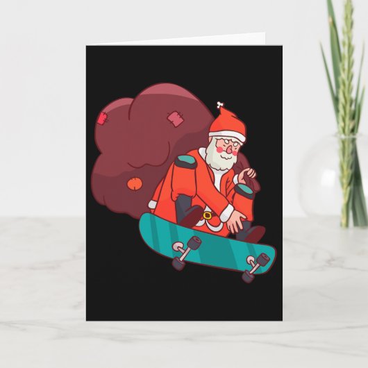 サンタクロースのスケートボード面白いクリスマスプレゼント カード (正面)