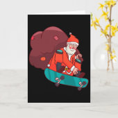 サンタクロースのスケートボード面白いクリスマスプレゼント カード (黄色い花)