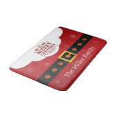 サンタクロースのスーツの雪片の装飾のメリークリスマス バスマット (アングル)