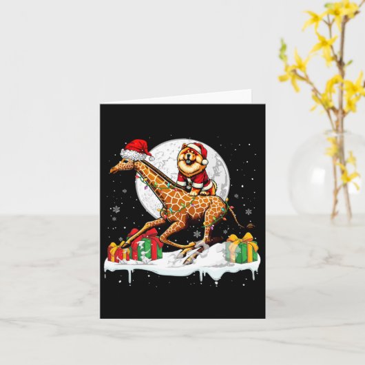 サンタクロースのチャウチャウがキリンを乗ってクリスマスの飼い主の子供 カード (黄色い花)