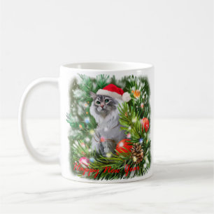 サンタクロースの帽子とクリスマスツリーの猫 コーヒーマグカップ