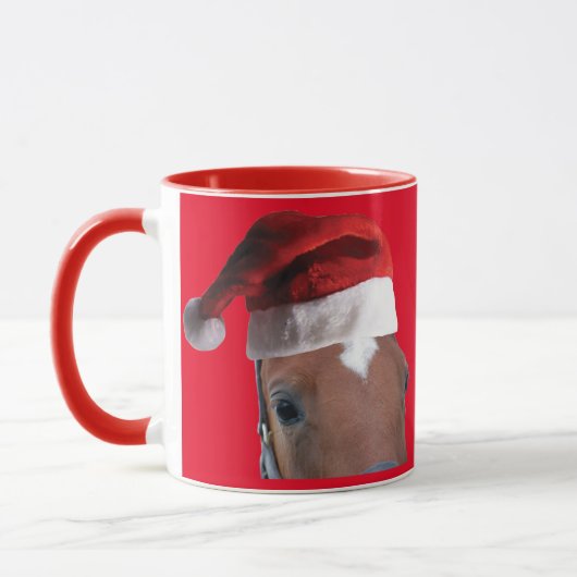 サンタクロースの帽子をかぶったクリスマスホース マグカップ (左)