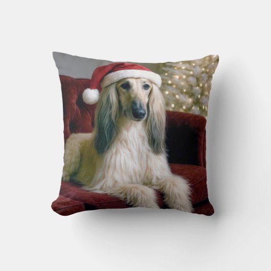 サンタクロースの帽子を被ったアフガンハウンド クッション (正面)