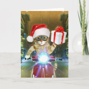 サンタクロースの帽子を被った猫がクリスマスプレゼントを配達する カード