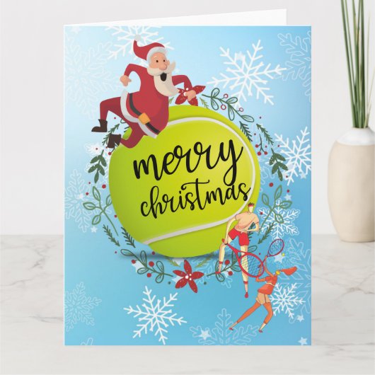 サンタクロースの後ろのテニスボール メリークリスマス   カード (正面)