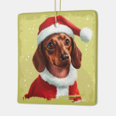 サンタクロースの衣装を着たダックスシュント – クリスマス1 セラミックオーナメント (左)