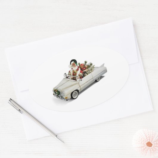 **サンタクロースは新しい乗り物** 楕円形シール (封筒)