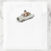 **サンタクロースは新しい乗り物** 楕円形シール (バッグ)