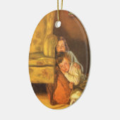 サンタクロースを待つヴィンテージのクリスマスの子供たち セラミックオーナメント (左)