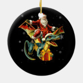 サンタクロース乗馬の恐竜Tレックスクリスマスのプレヒー セラミックオーナメント (裏面)