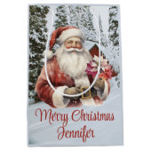 サンタクロース冬の雪のクリスマスシーンを名前を追加 ミディアムペーパーバッグ (正面)