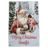 サンタクロース冬の雪のクリスマスシーンを名前を追加 ミディアムペーパーバッグ (裏面)