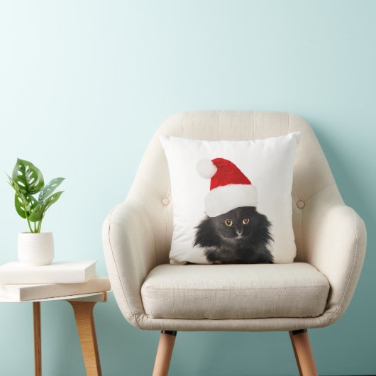 サンタクロース帽を被った白黒のクリスマス猫 クッション (椅子)