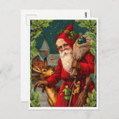 サンタクロース来は贈り物でいっぱいのバッグを持っている ポストカード (正面/裏面)