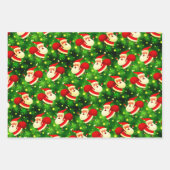 サンタクロース来は3つのデザインに巨大なバッグを持っている ラッピングペーパーシート (正面)