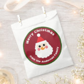 サンタクロース顔オンレッドメリークリスマス フェイバーバッグ (クリップ留めされた状態)