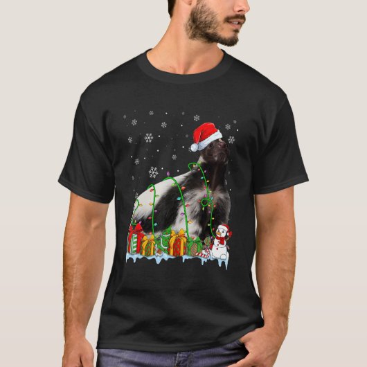サンタハッおもしろいスカンククリスマスライトアニマル値リスト Tシャツ (正面)