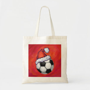 サンタハットがサッカーボールを赤に トートバッグ